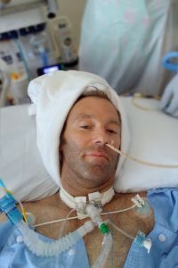 Clint laying in bed on the FSH ICU.