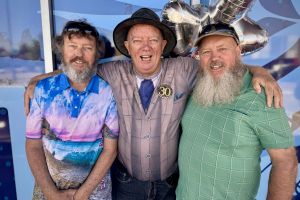 Rod pictured centre with his brothers.