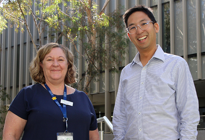 Fiona Stanley Hospital Medical Oncology Research Officer Trish Barrett and Head of Service, Medical Oncology Dr Wei-Sen Lam stand outside a building