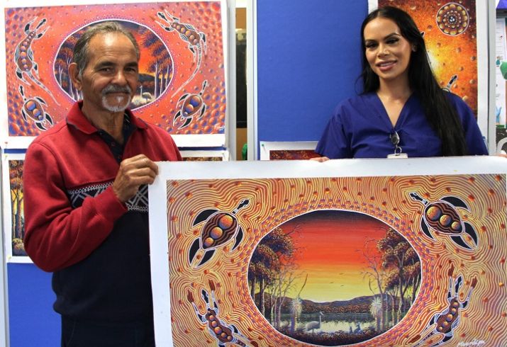 Athol and Alea with his Moordi Pa artworks